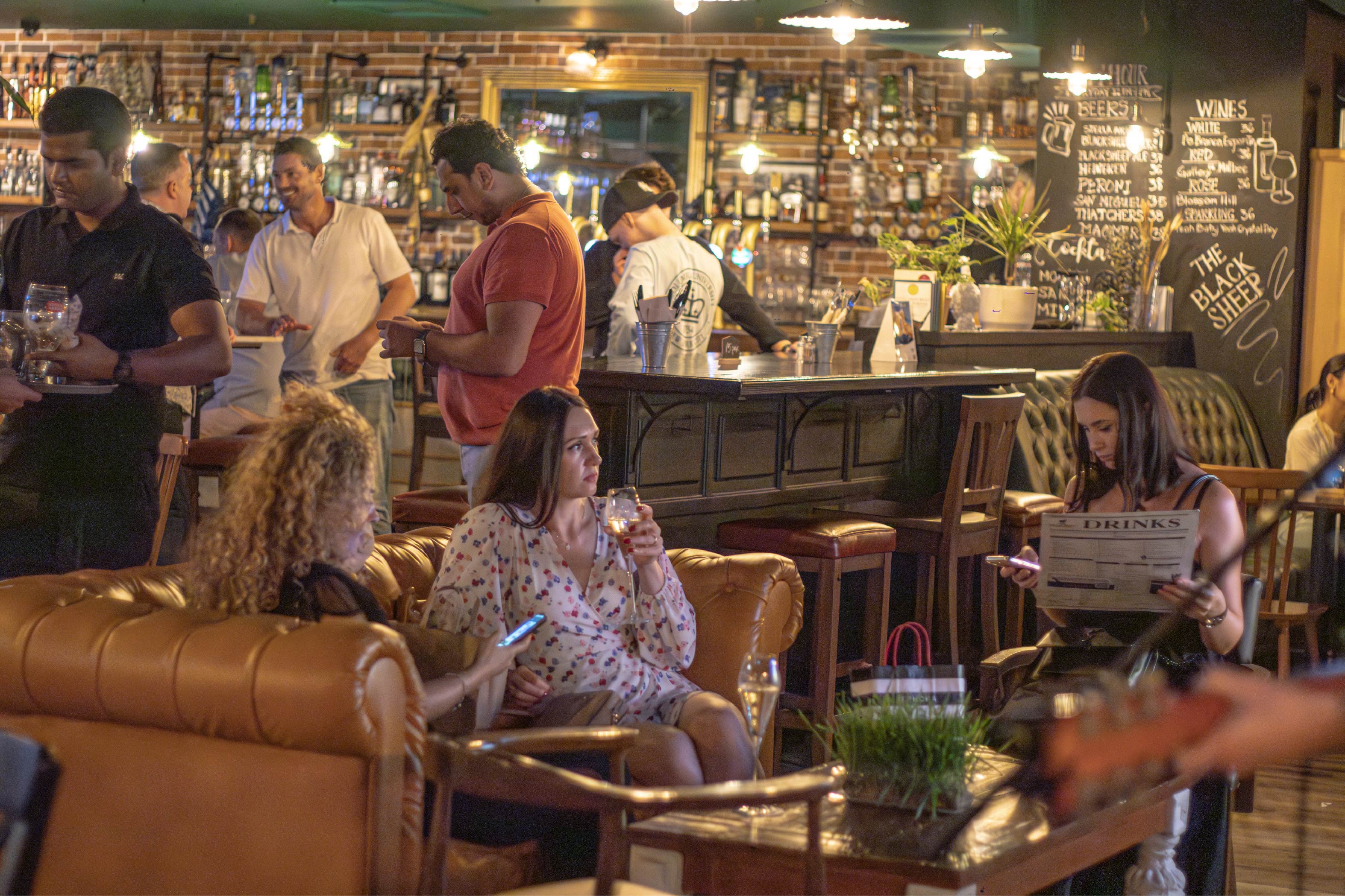 Guests watching live sports at The Black Horse